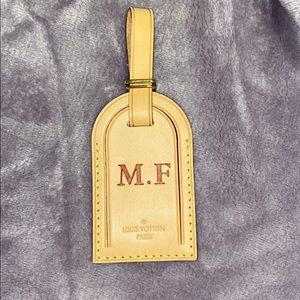 Authentic Louis Vuitton luggage tag